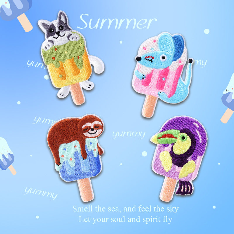 Set of 4 embroidered animal ice-pop patches on display, each with a stick handle