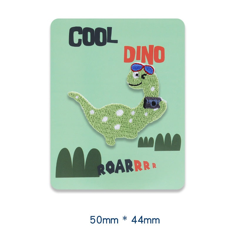 Green self-adhesive embroidered dinosaur patch, 50x44 mm.