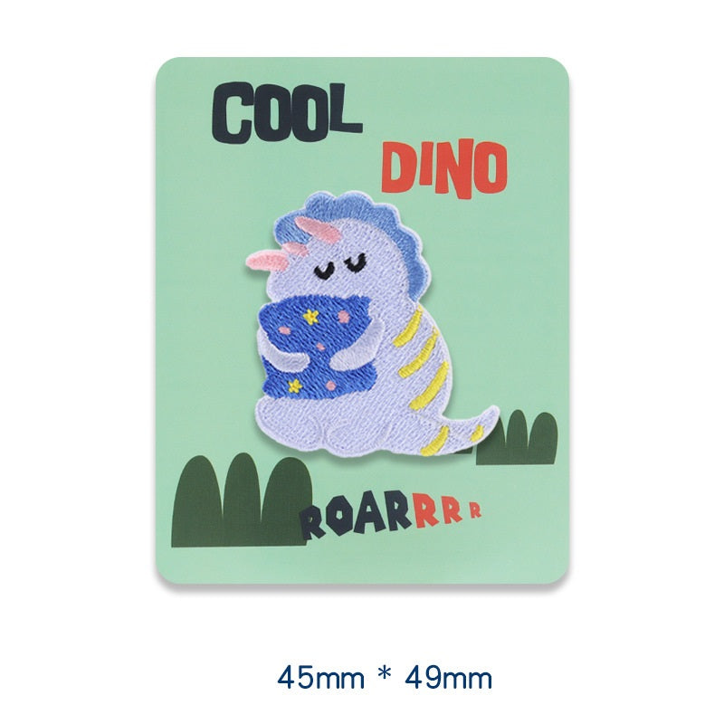 Purple self-adhesive embroidered dinosaur patch, 45x49 mm.