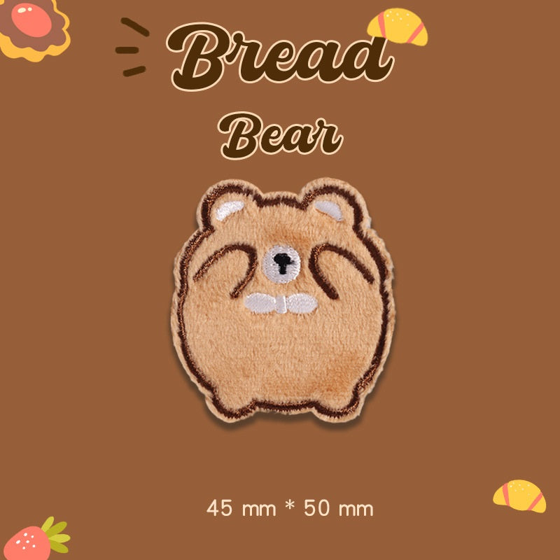Tan plush bear embroidered patch with friendly face, 45 mm x 50 mm