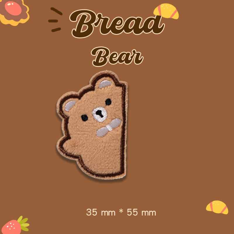 Tan plush bear embroidered patch, side pose with paw, 35 mm x 55 mm