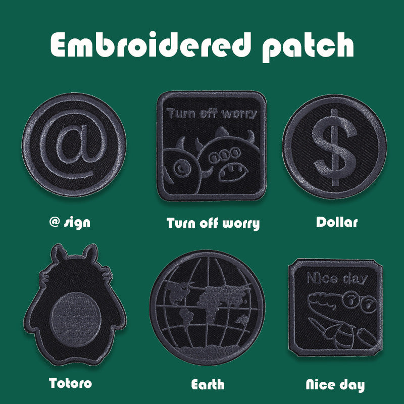 Black embroidered badge patches: @ sign, Turn off worry, dollar, Totoro, Earth, and Nice day