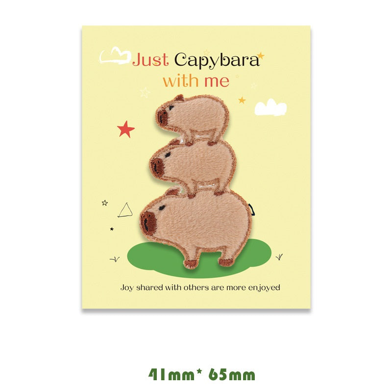 Brown and tan capybara embroidered self-adhesive patch, stacked standing pose, small size.