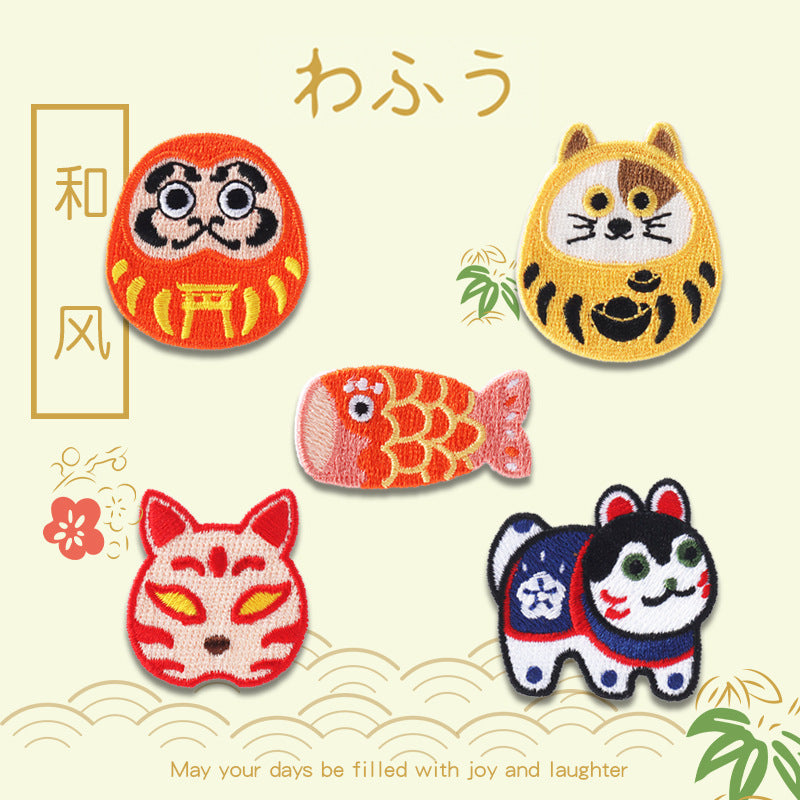 5-pack self-adhesive embroidered character patches: Daruma-style face, tiger, fish, fox, panda