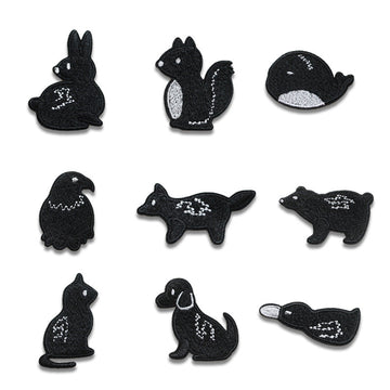 Selbstklebende schwarze Tierstickerei-Patches (9er-Set) mit weißen Akzenten