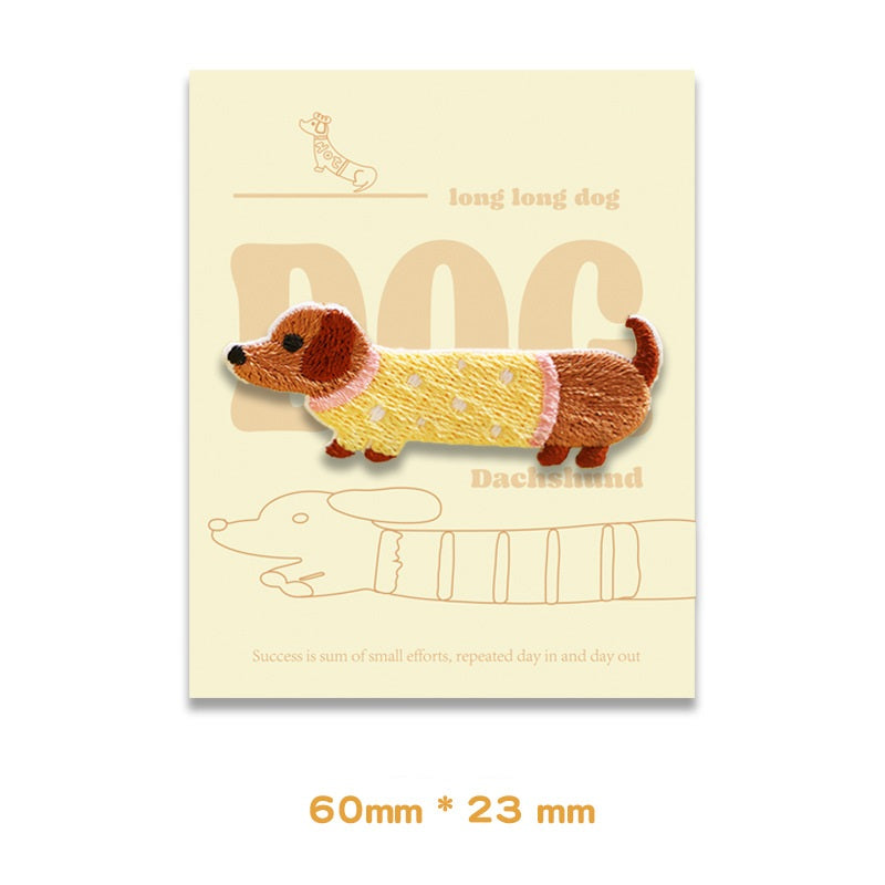Embroidered dachshund patch, brown and yellow with pink spots, 60 x 23 mm