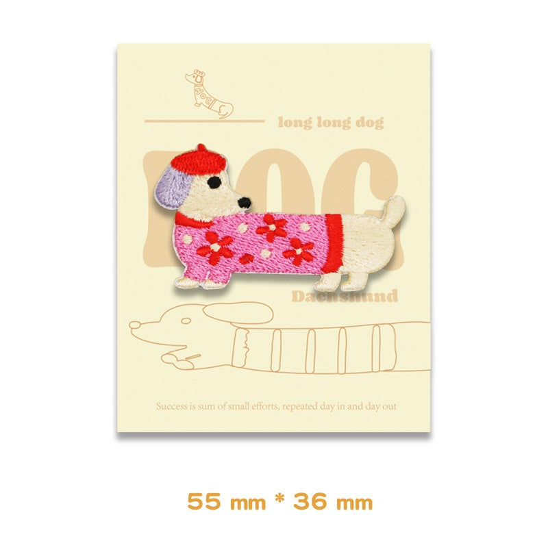 Embroidered dachshund patch, lavender with red collar and pink flowers, 55 x 36 mm