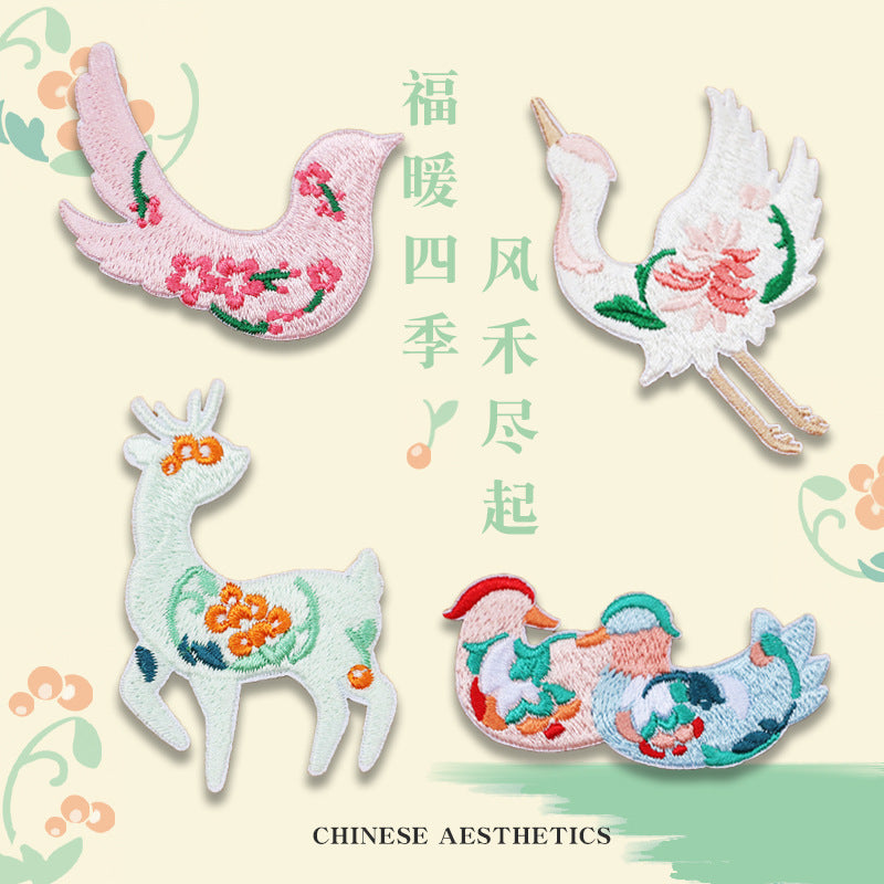 Set of 4 self-adhesive embroidered animal patches: pink bird, white bird, deer, blue fish