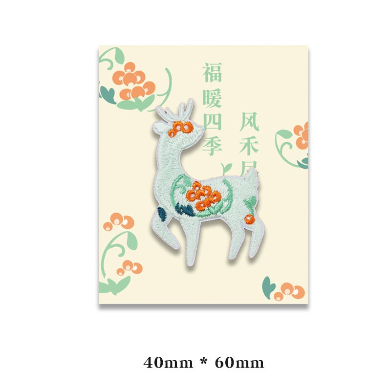 Light blue embroidered deer patch with orange flower, self-adhesive backing