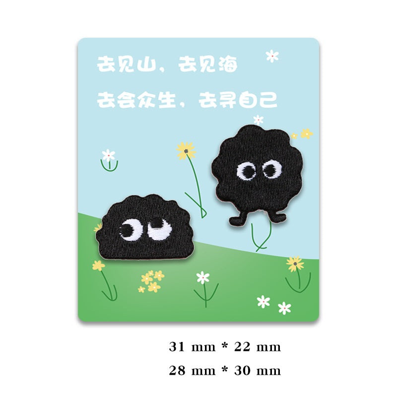 Two black self-adhesive coal ball elf patches with embroidered white eyes