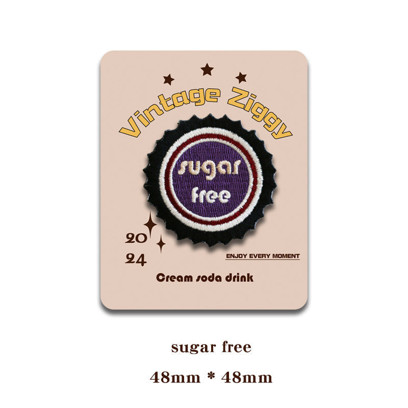 Self-adhesive bottle cap patch “sugar free” in dark purple circle