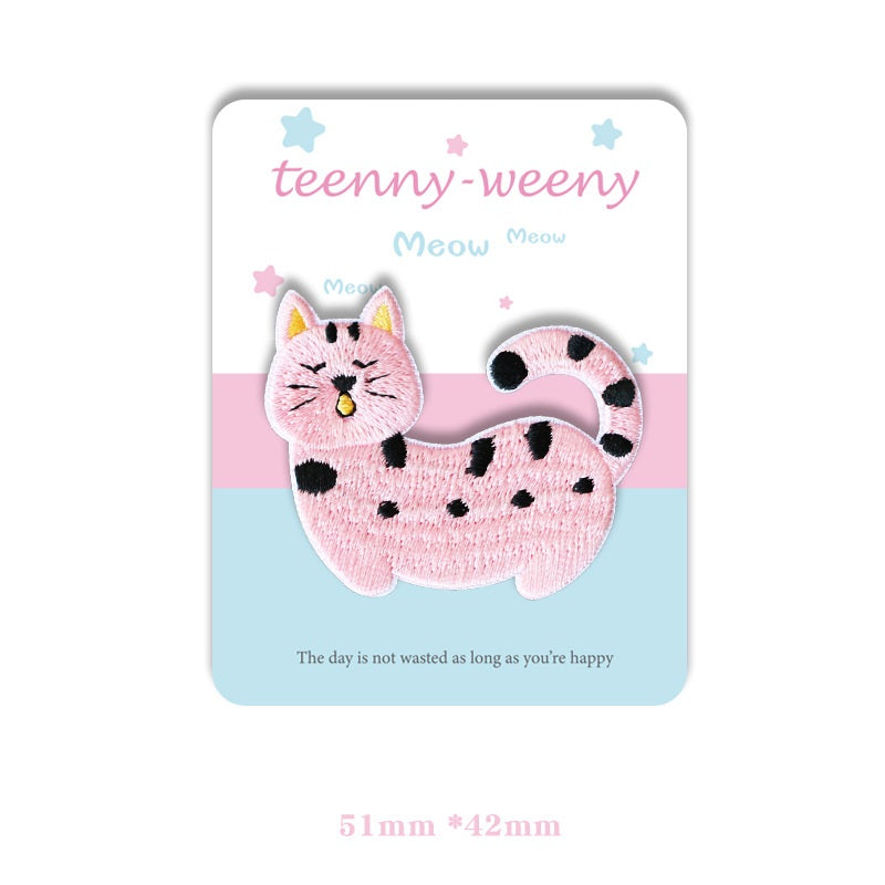 Pink-and-black spotted kitten patch with curved tail, self-adhesive embroidered