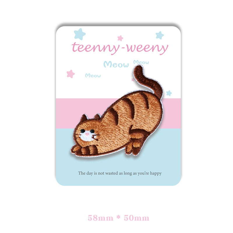 Brown cat self-adhesive embroidered patch, curled body and raised tail