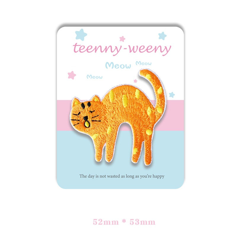 Orange tabby cat self-adhesive embroidered patch, arched tail and standing pose