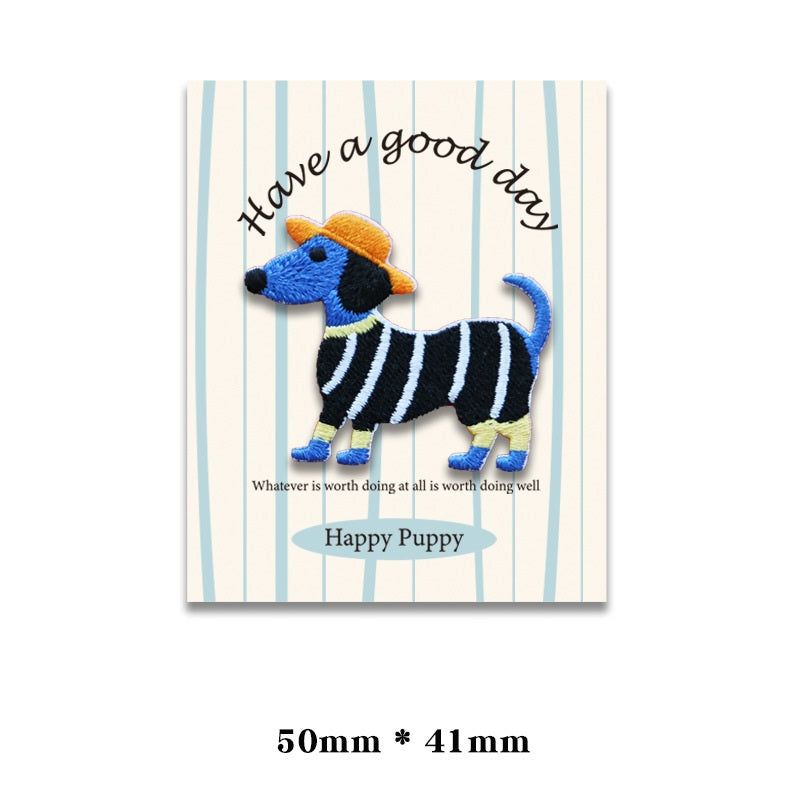 Embroidered dog patch: blue-and-black striped dog with orange cap and blue tail