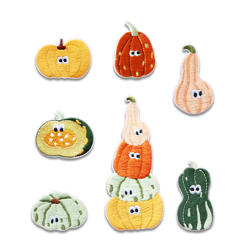 7 self-adhesive embroidered pumpkin patches with cartoon faces, assorted yellow, orange, green