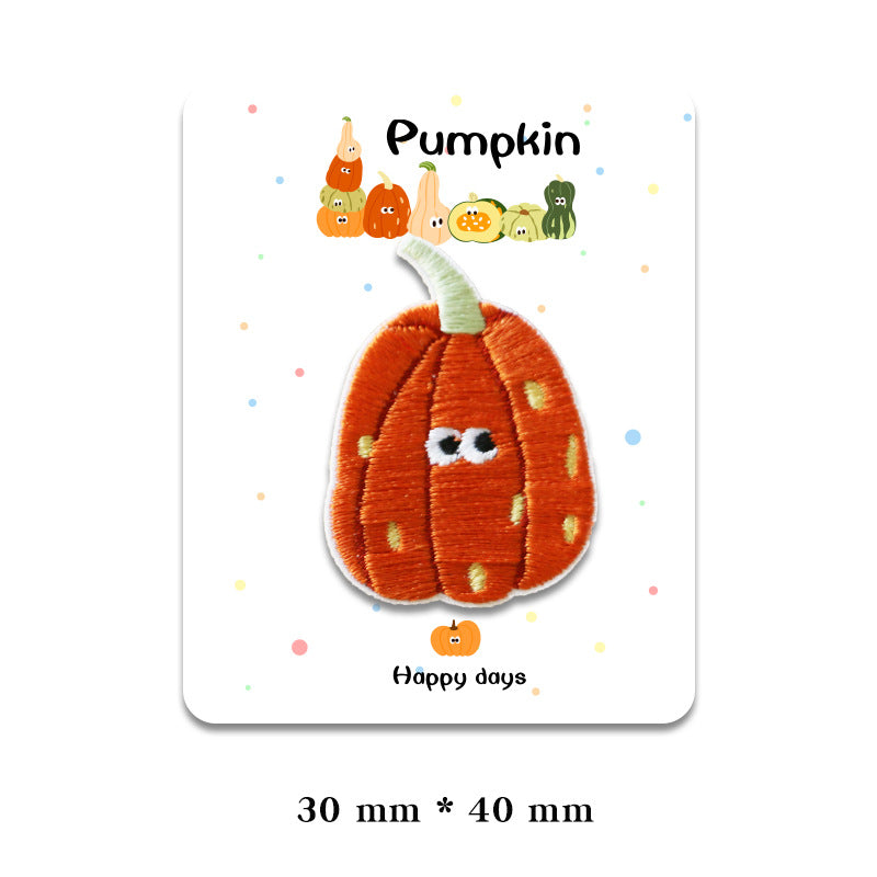 Orange pumpkin patch with yellow dot pattern, stitched face, and small stem