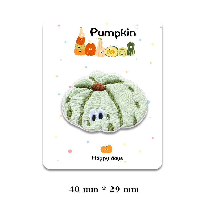 Light green pumpkin patch with brown stem and embroidered face