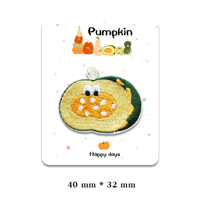 Light yellow pumpkin patch with dark green edge and embroidered face