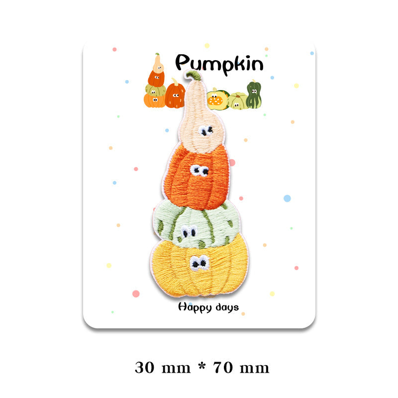 Stacked pumpkin character embroidered patch with orange, green, and yellow faces