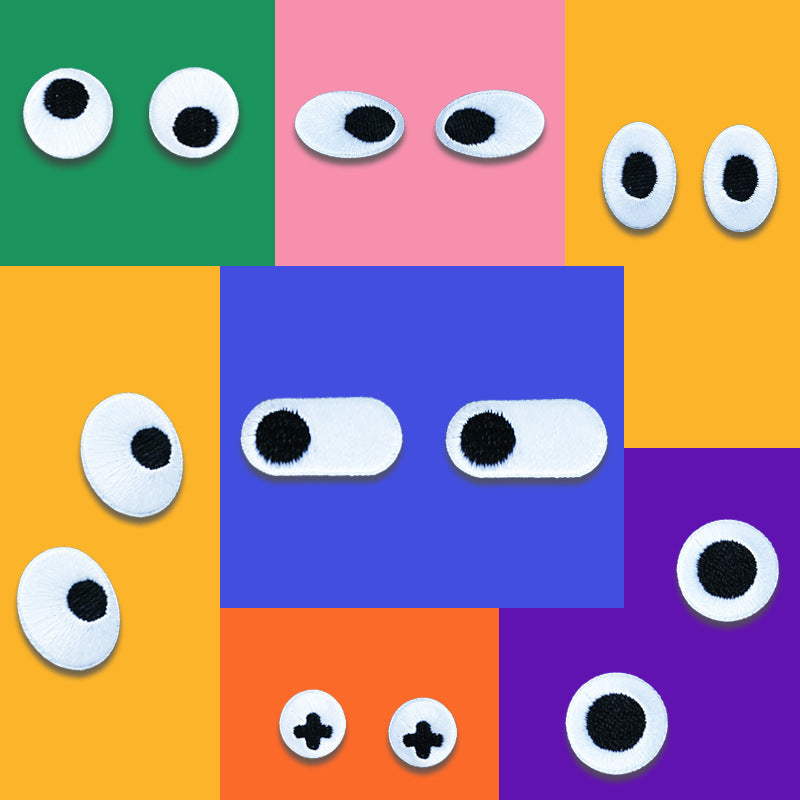 Assorted embroidered emoji patches: white oval eyes and red mouth/lip shapes