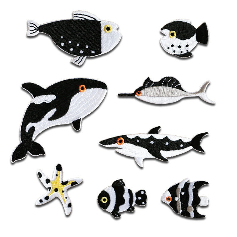 Self-adhesive embroidered marine animal patches set with multiple fish and starfish designs