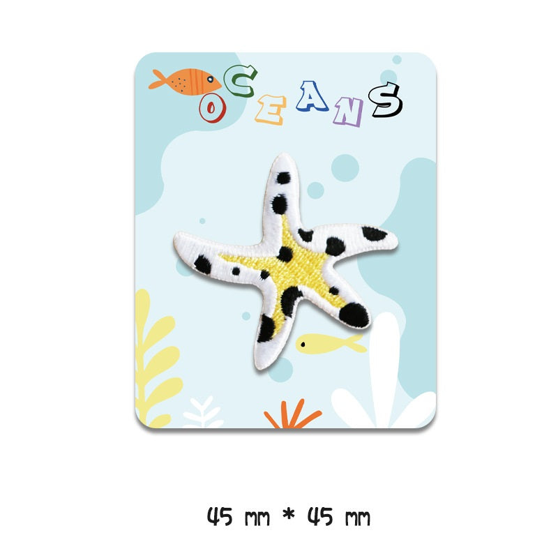 Yellow and black starfish embroidered patch, 45 mm x 45 mm, self-adhesive