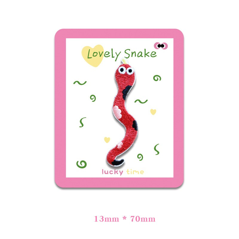 Red snake embroidered cloth patch with big eyes and curled tail