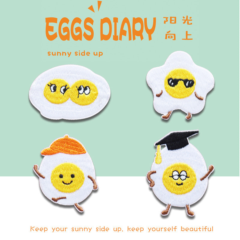 Set of 4 embroidered fried egg patches with different cartoon expressions