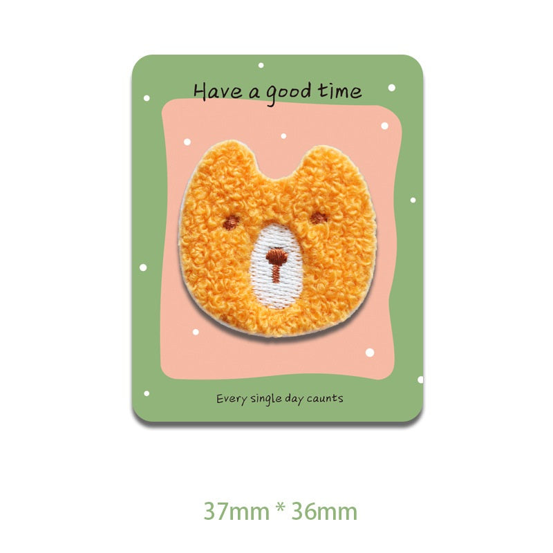 Plüsch Bärenkopf Patch, orange, bestickt mit ovaler Nase und braunem Mund