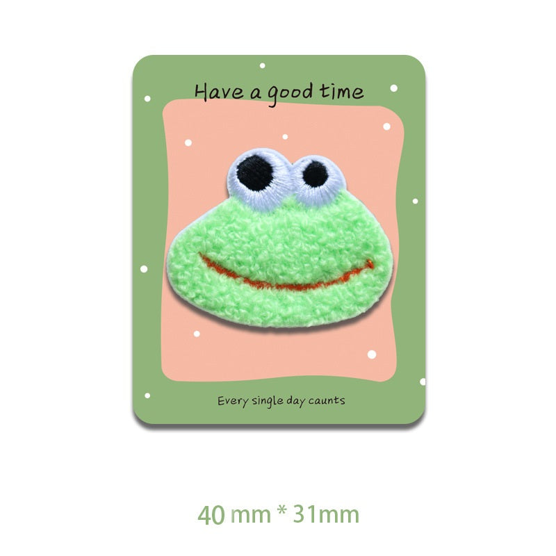 Plüsch Froschkopf Patch, hellgrün, bestickt mit großen Augen und lächelndem Mund