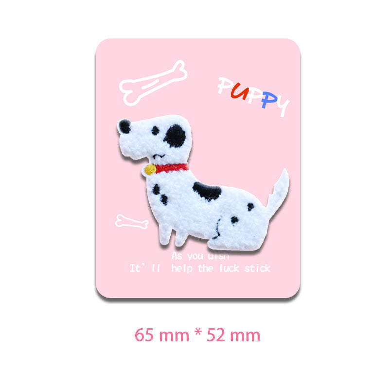 White dog patch, standing pose, black ear spots, red collar with yellow tag