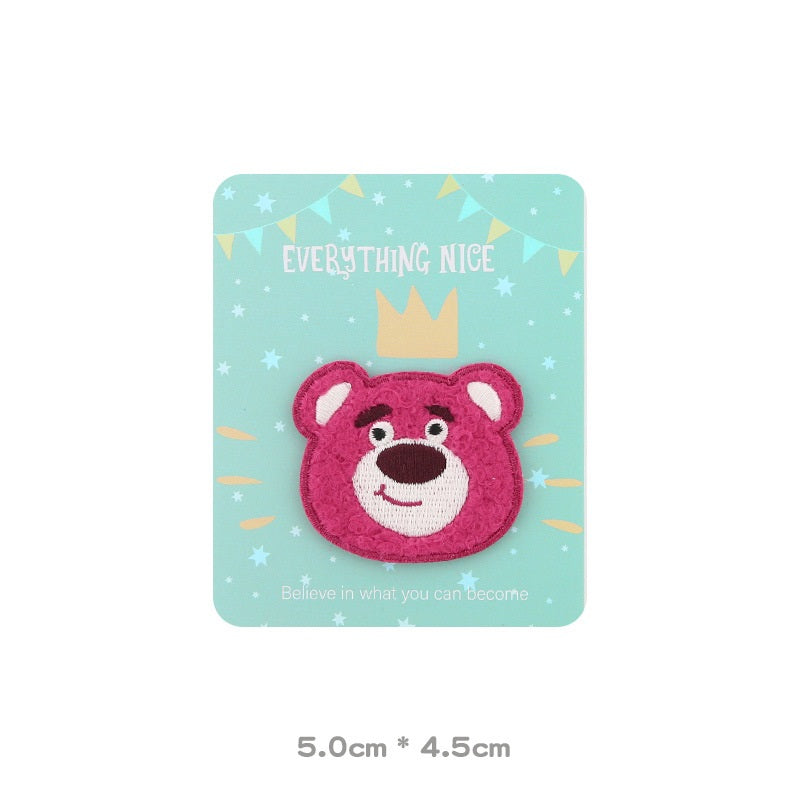 Pink embroidered bear head patch with friendly face, rounded ears and white muzzle