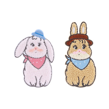 2 self-adhesive embroidered towel patches: blue-hat bunny and brown rabbit