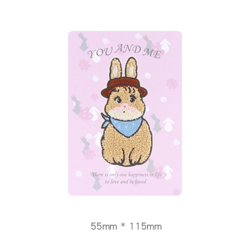 Embroidered self-adhesive brown rabbit towel patch with blue scarf