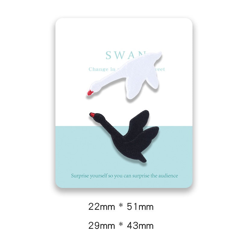 Carded swan adhesive patches: white and black swans, 22x51mm and 29x43mm