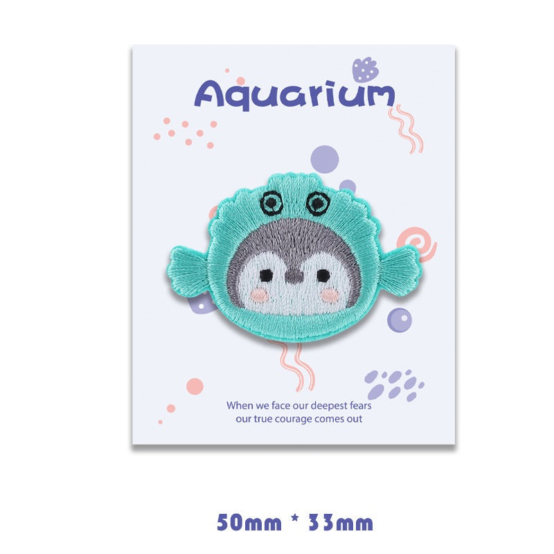 Turquoise balloonfish self-adhesive embroidered patch with gray face and fin ears