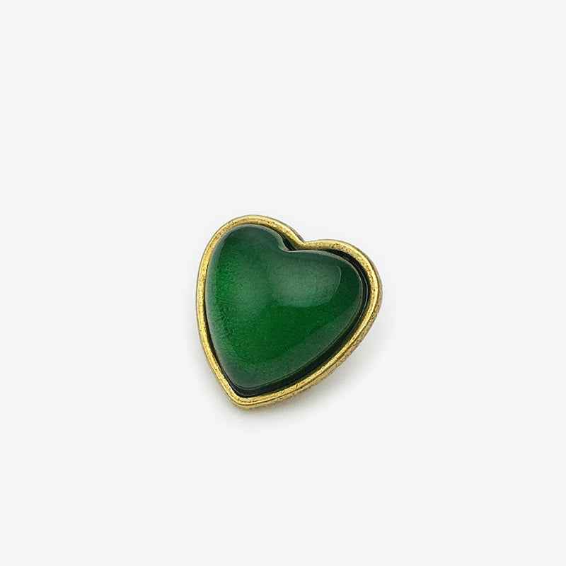 15mm heart buttons, green center with gold-tone border (front view)