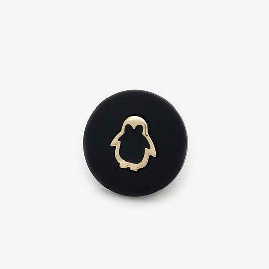 Black resin shank button with gold penguin outline