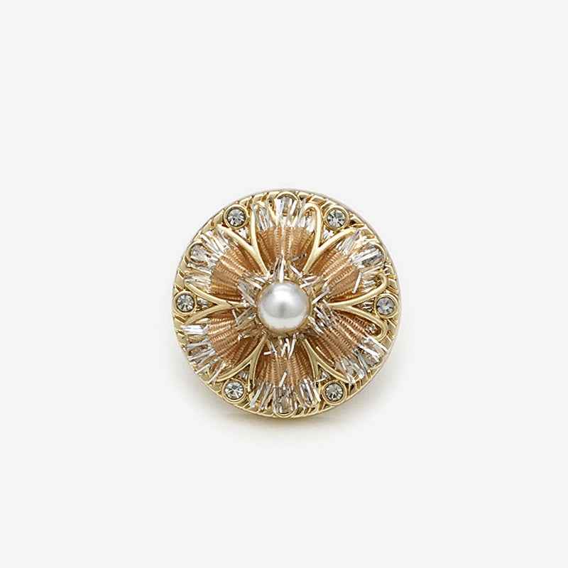 Champagne hand-knitted floral shank button with central pearl and clear rhinestones