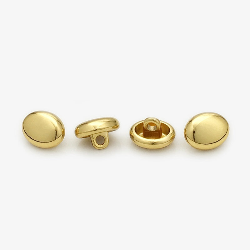 Tea gold glossy oval metal shirt buttons; 11mm, hand-sewn, four views