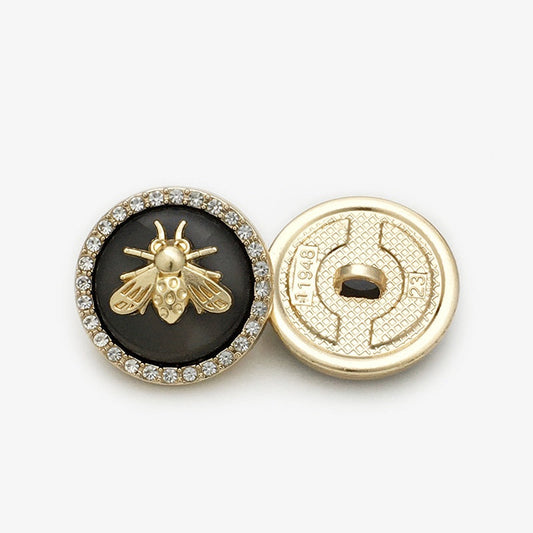Bee coat button, black two-tone, gold bee motif with rhinestone rim; back shown