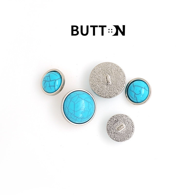 Set of turquoise imitation metal buttons with shanks; silver-toned backs visible (5 pcs)